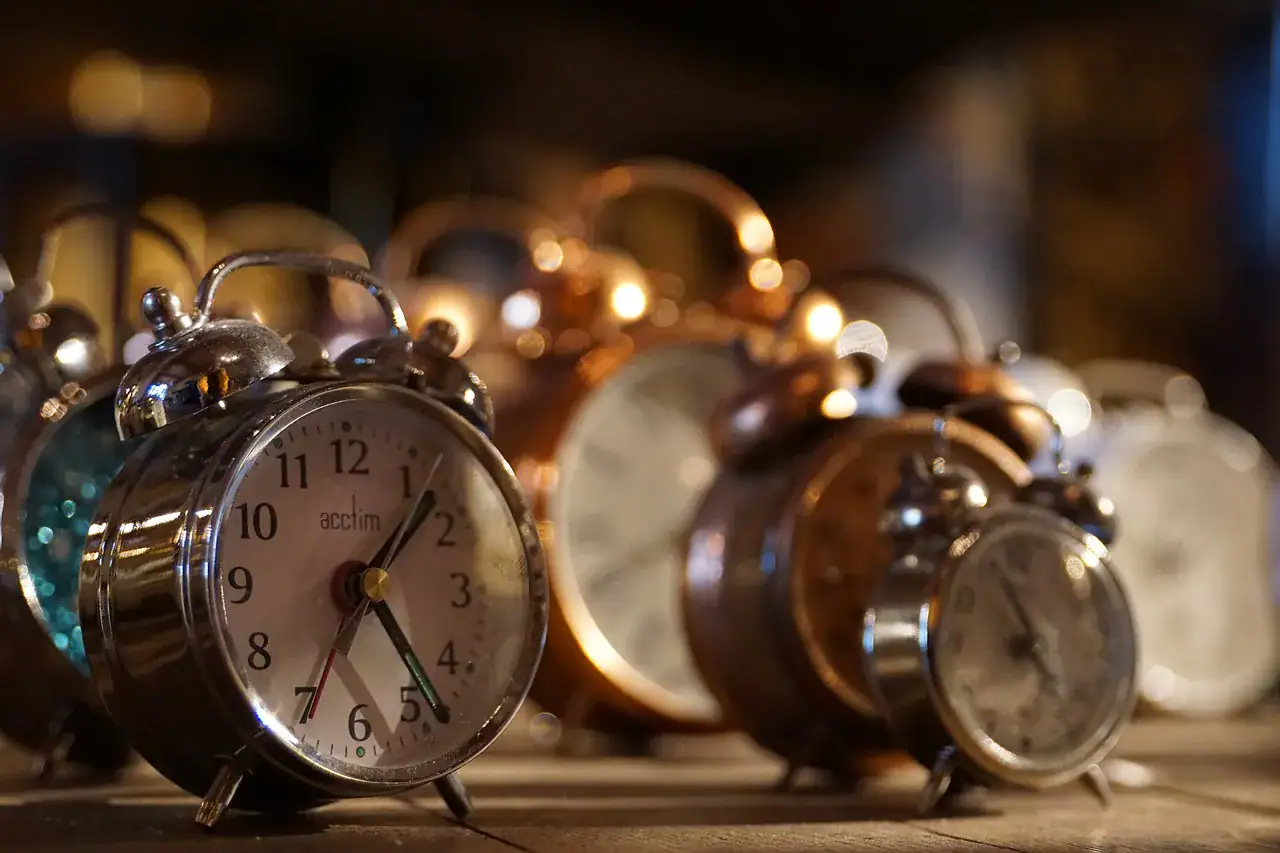 Alarm clocks showing different times, symbolizing urgency and time management in home health care.