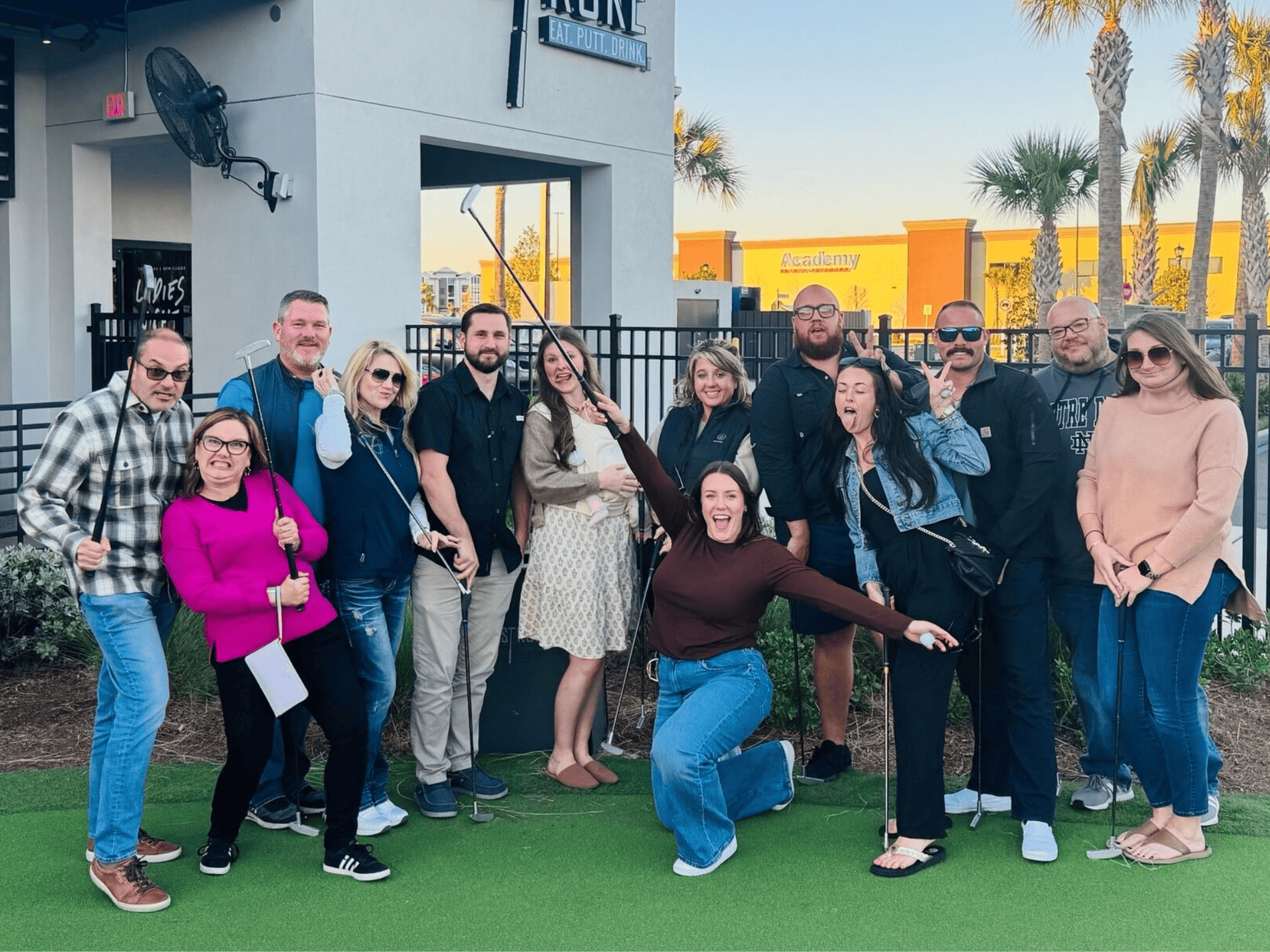 Group of diverse people enjoying an outdoor event at VitalCaring.